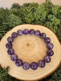 Amethyst crystal bracelet with chunky polished round purple beads