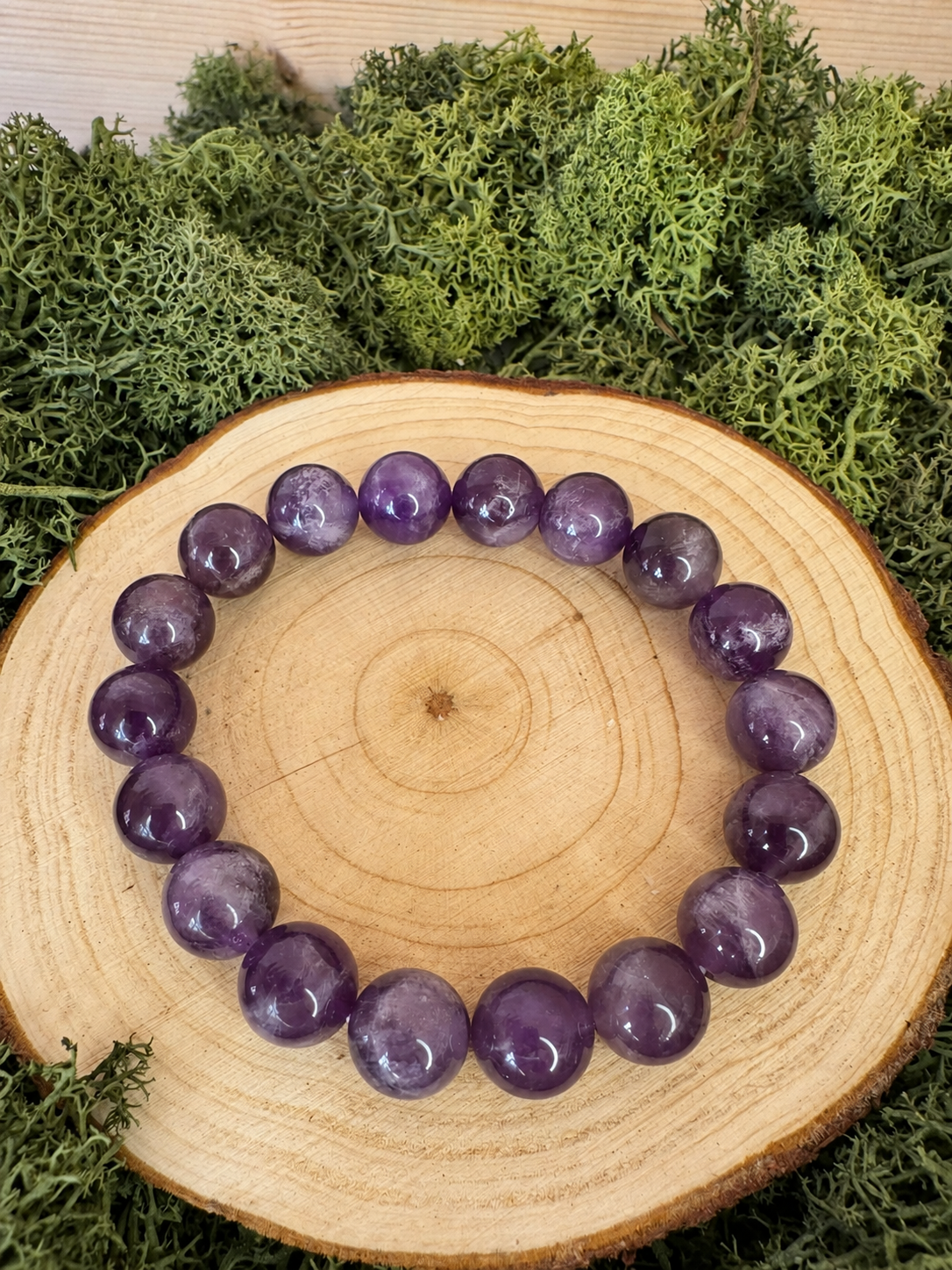 Amethyst crystal bracelet with chunky polished round purple beads