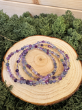 Four faceted natural Fluorite crystal bracelets with purple green and yellow beads