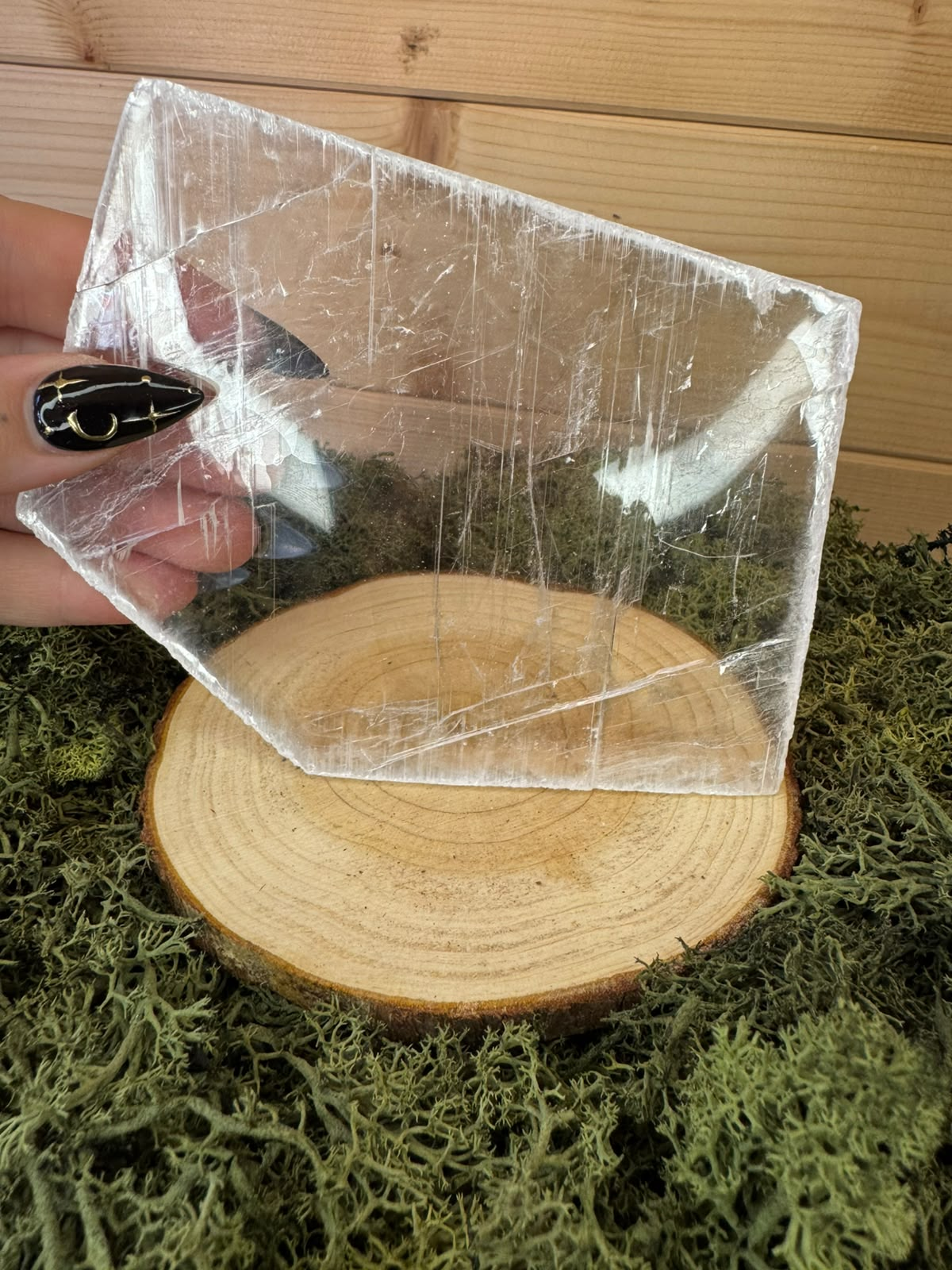 Genuine transparent Selenite slab showing natural cleavage lines and crystal structure