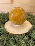 Golden Healer Quartz sphere with rich honey-gold colouring, 417g
