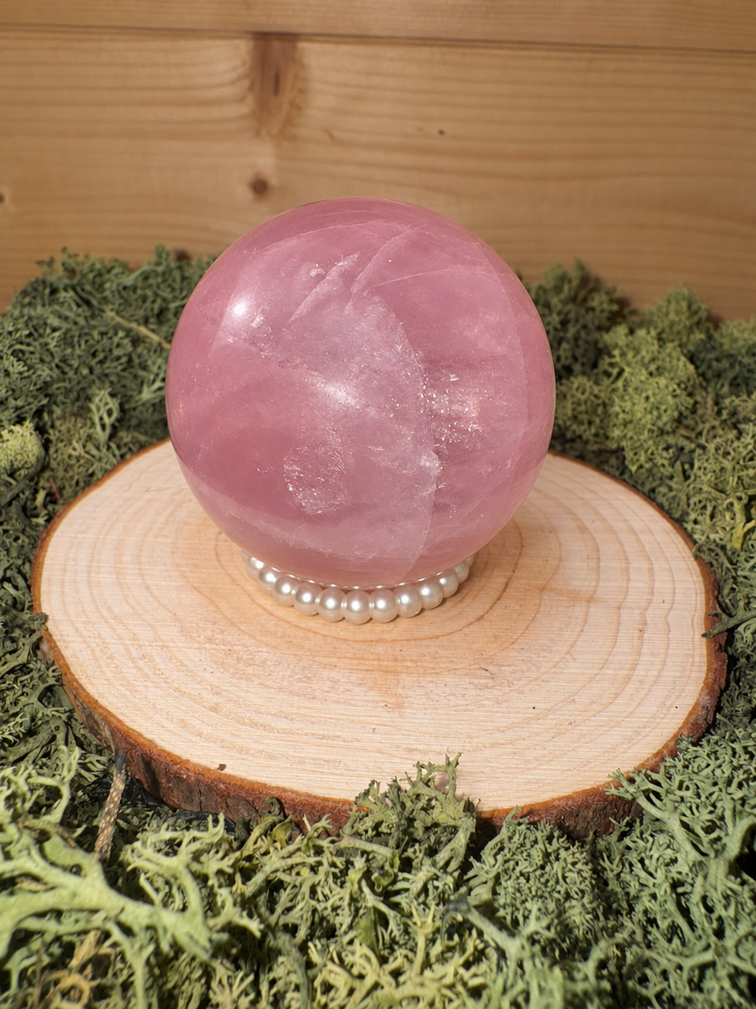 High grade Starlight Rose Quartz crystal sphere with rich translucent pink colouring, 242g