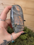Close view of 202g Labradorite freeform showing copper peach and gold flash