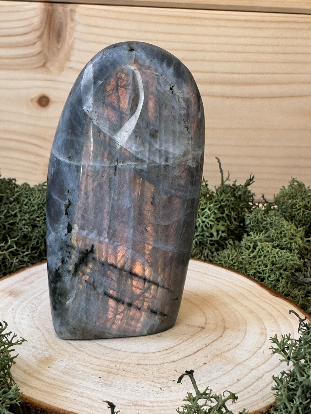 Polished Labradorite freeform A weighing 202g with warm copper and golden flash