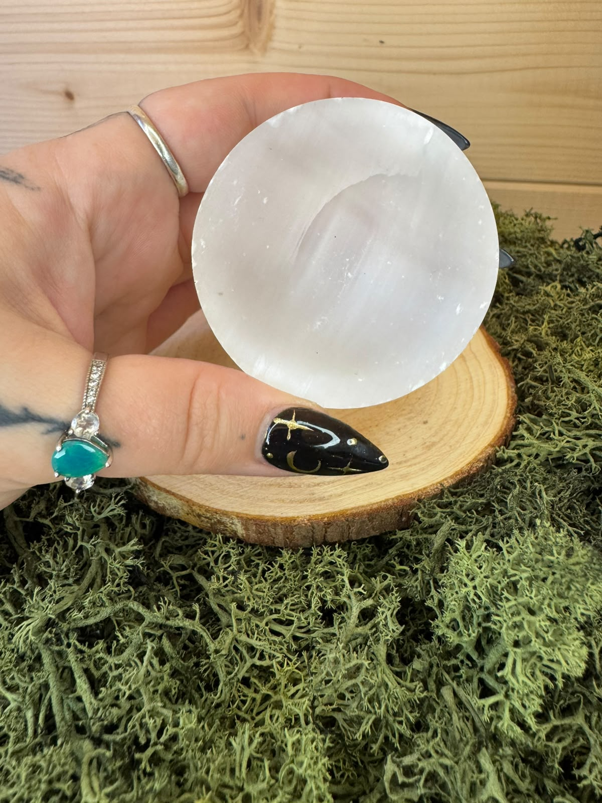 Mini white Selenite crystal bowl approximately 60g held in hand