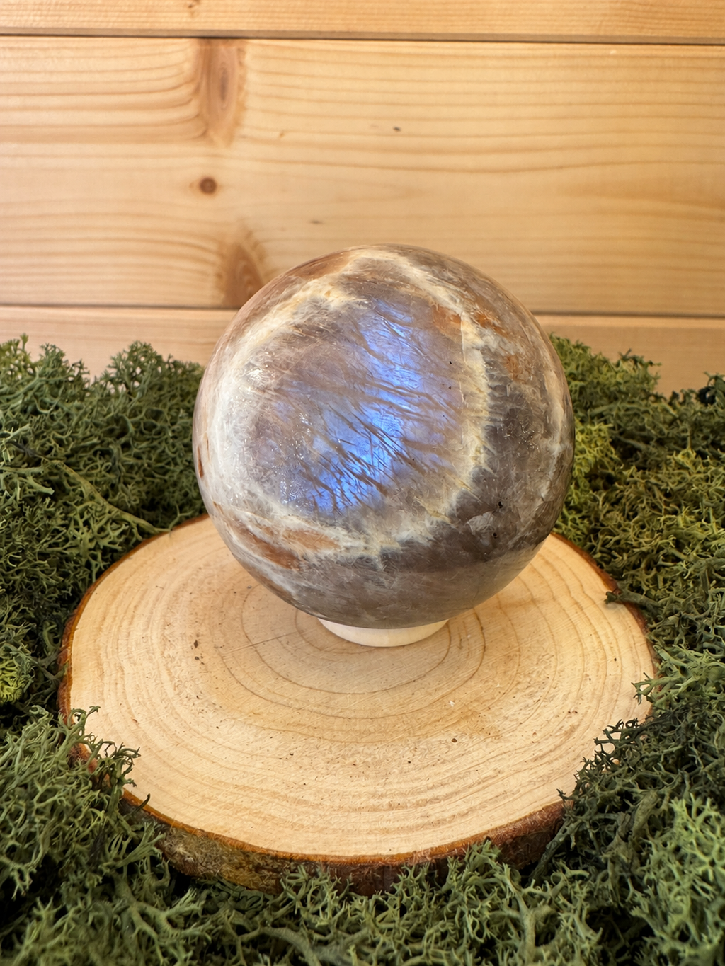 471g Moonstone and Sunstone crystal sphere displayed on included stand