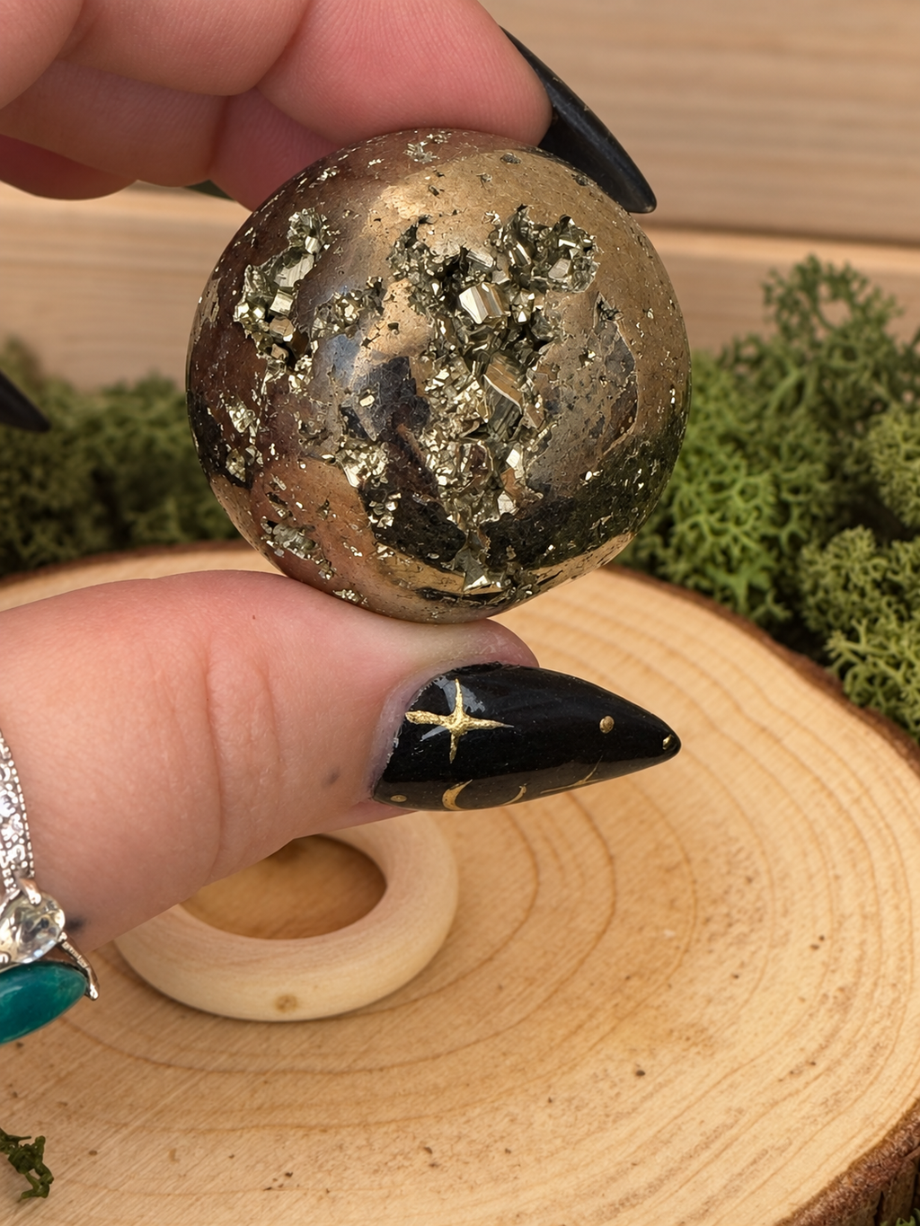 Close up of Peruvian Pyrite sphere with exposed crystalline Pyrite formations