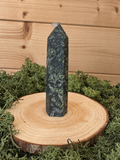 Polished Kambaba Jasper crystal tower with natural green orb markings