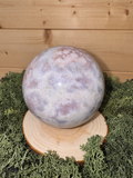 Pink Amethyst crystal sphere with pale lilac pink and cloudy white patterning
