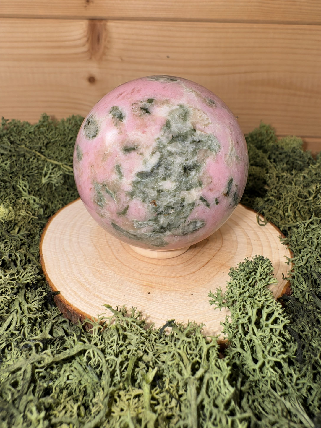 Epidote in Pink Opal sphere showing natural mossy green Epidote inclusions in pink stone