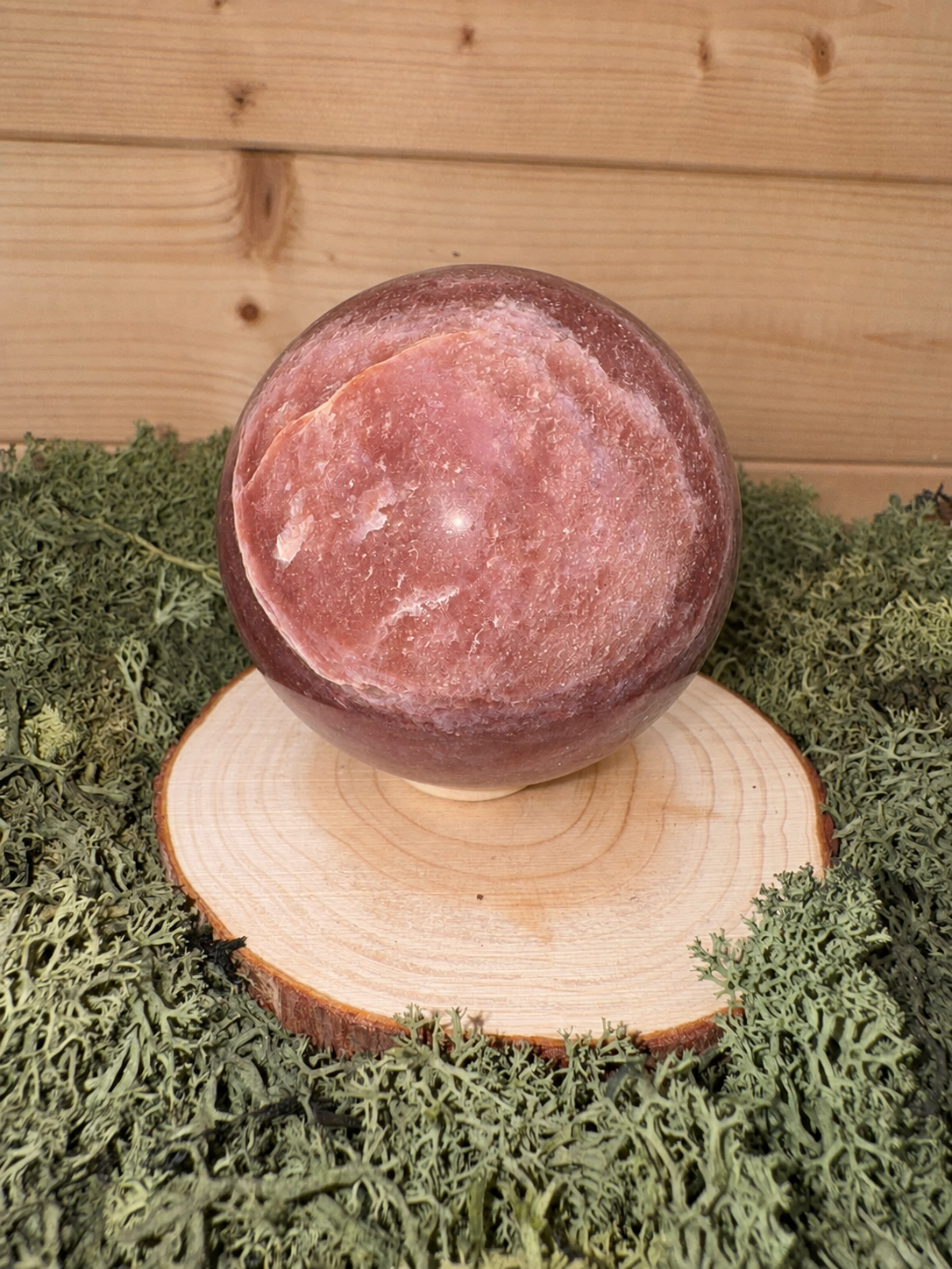 Large pink Strawberry Quartz crystal sphere with natural colour variation and polished finish