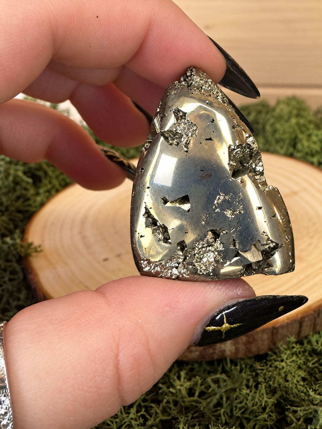 Polished metallic surface of natural Peruvian Pyrite freeform