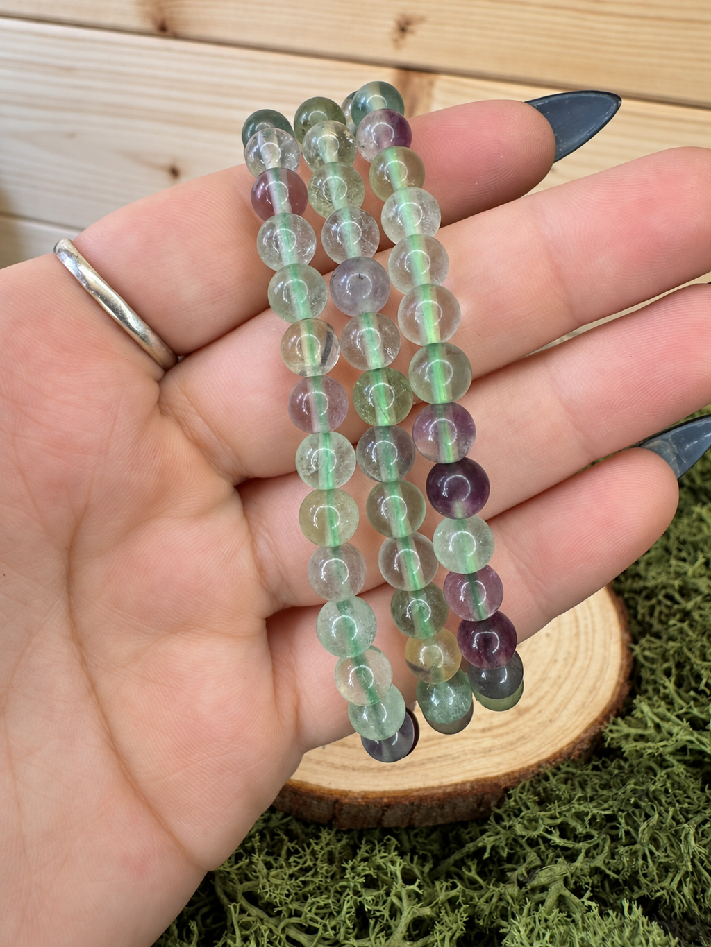 Polished Rainbow Fluorite bracelet with green purple and lilac round crystal beads