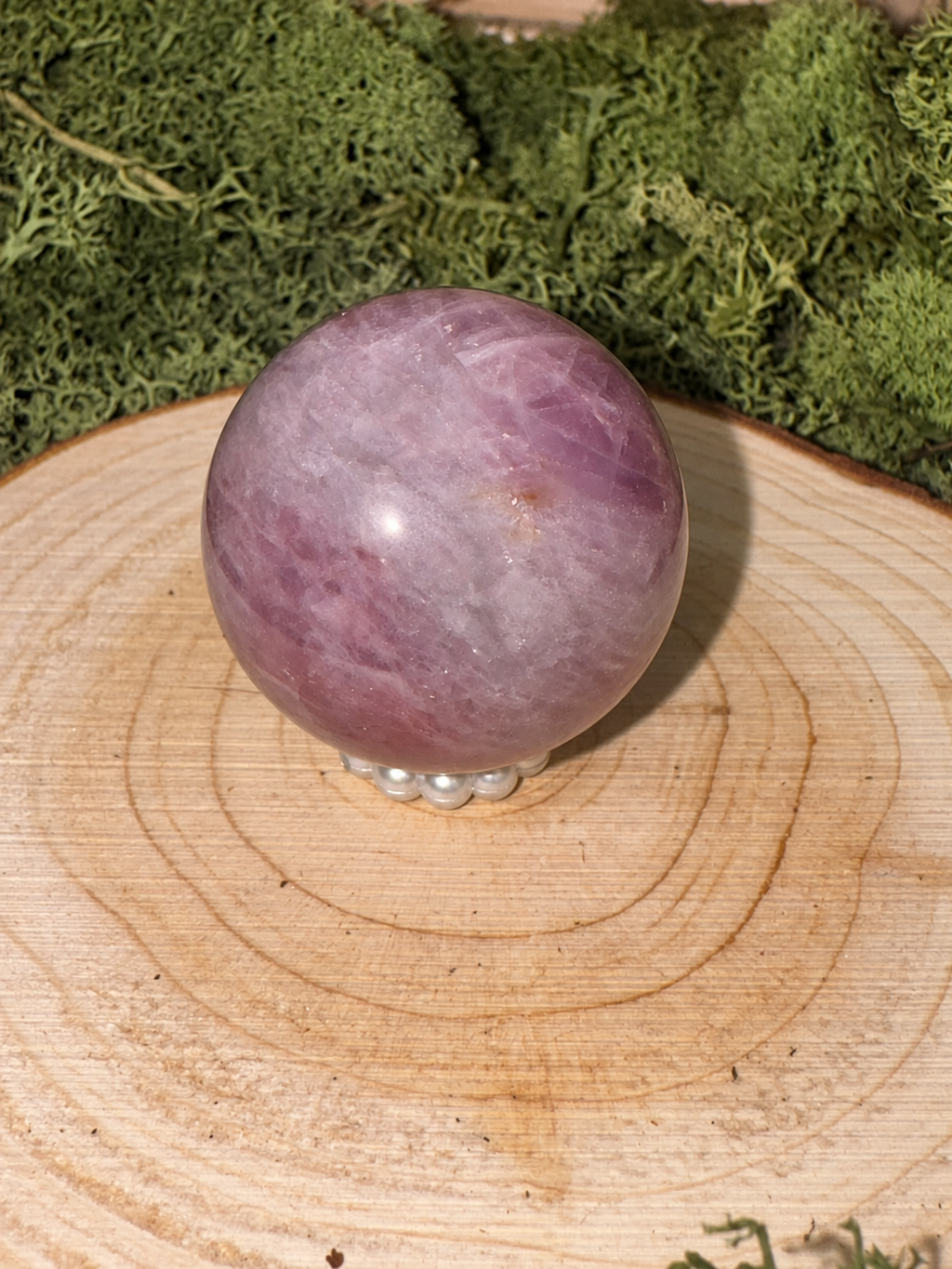 Polished 59g Periwinkle Quartz sphere showing lilac and pink tones
