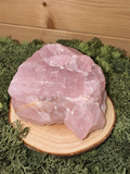 Large 457g raw Rose Quartz crystal specimen showing natural pink crystalline texture
