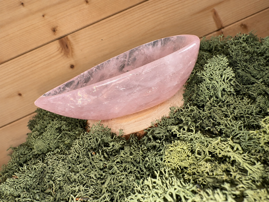 Side view of polished Rose Quartz teardrop crystal bowl