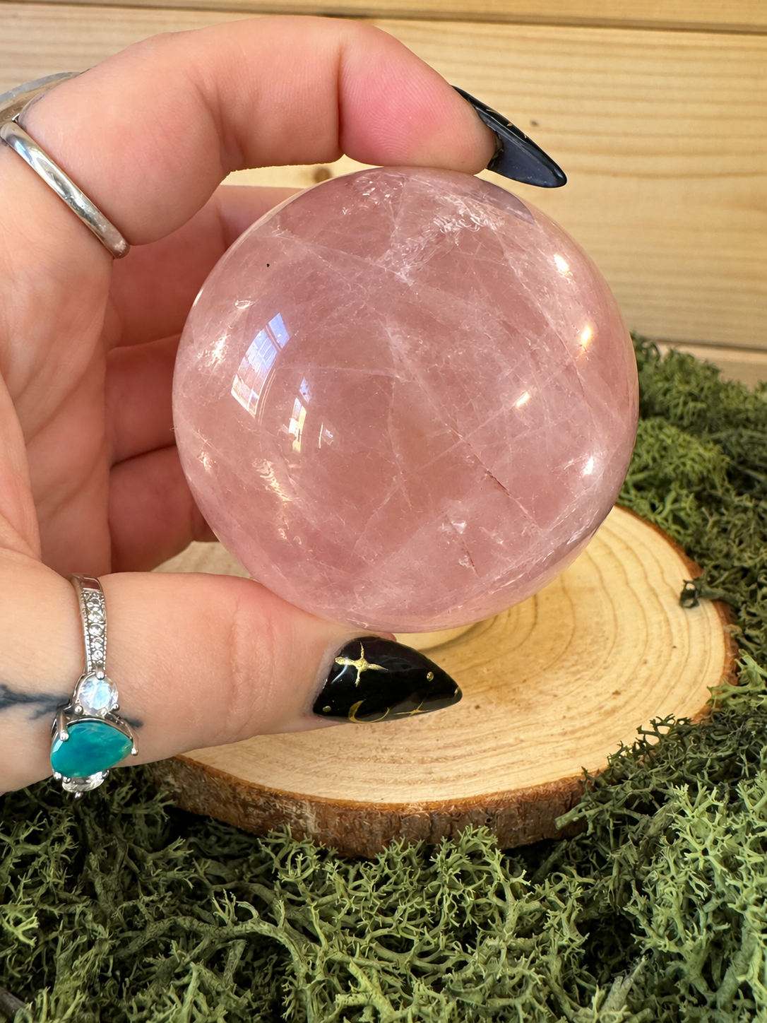 Rose Quartz crystal sphere with asterism and internal rainbow inclusions